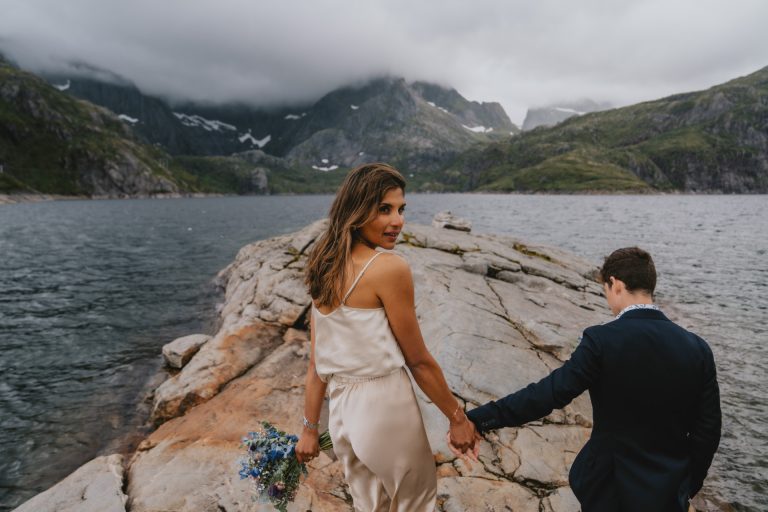 How to choose your elopement photographer. Walking towards their elopement ceremony in Lofoten, Norway. By Christin Eide Photography